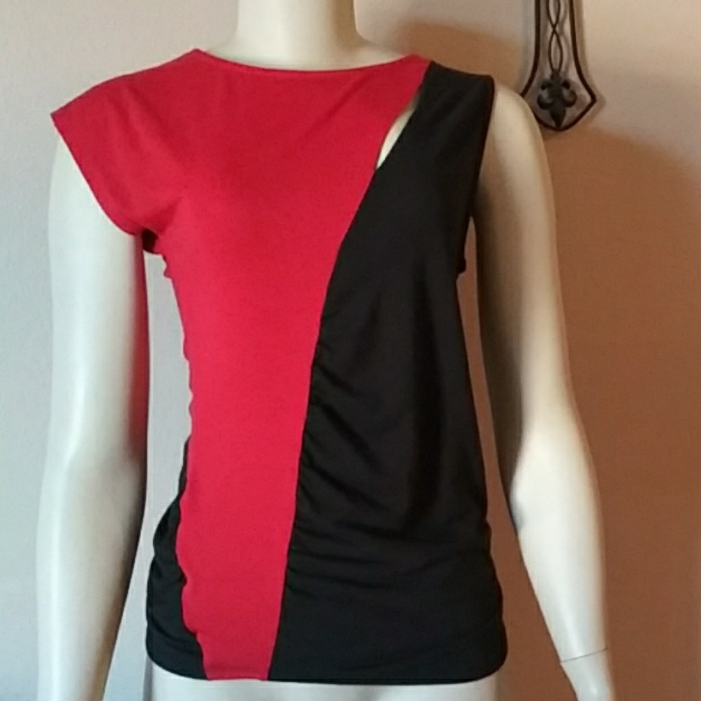 Poof,  Beautiful black red top with sexy openings.